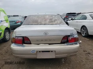 1995 Toyota Camry LE z VIN 4T1SK12EXSU529058, wystawiony jako Copart lot #49055255 z przebiegiem 166 029 mil mil oraz Szkoda całkowita • Salvage title. Historia ofert i sprzedaży dostępna na DreamBid. Obrazek 6.