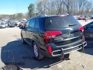 2014 Kia Sorento LX with VIN 5XYKTCA66EG483726, listed as a IAAI auction lot 41829970 with 102,294 mi miles and . Bid and sale history available at carsss.com. Image 3.