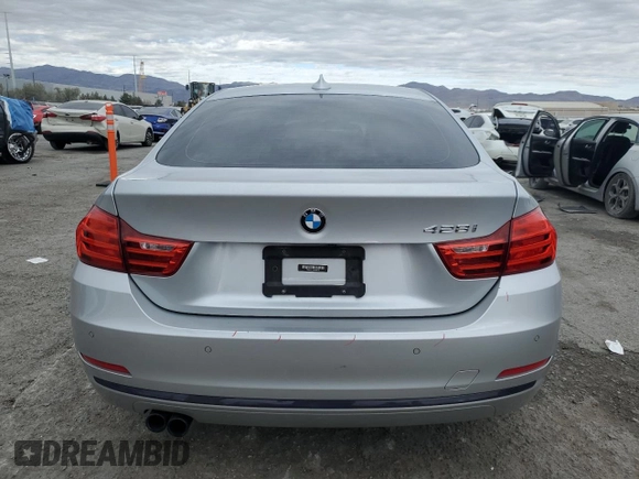 2015 BMW 4 Series 428i with VIN WBA4A9C54FGL85179, listed as a Copart auction lot 82369104 with 118,189 mi miles and Salvage title. Bid and sale history available at DreamBid. Image 6.