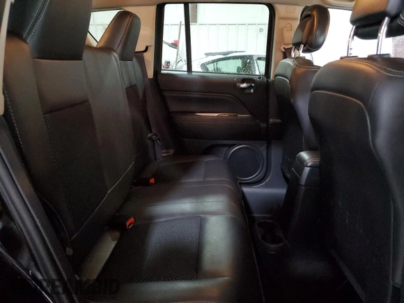 2016 Jeep Compass Latitude with VIN 1C4NJDEB2GD573909, listed as a Copart auction lot 62168225 with 70,944 mi miles and Salvage title. Bid and sale history available at DreamBid. Image 11.