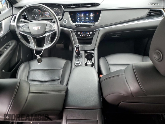 2023 Cadillac XT5 AWD Premium Luxury with VIN 1GYKNDRSXPZ145763, listed as a Copart auction lot 58387365 with 51,368 mi miles and Salvage title. Bid and sale history available at DreamBid. Image 8.