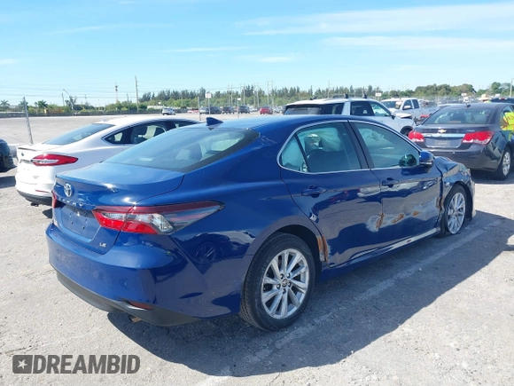 2024 Toyota Camry LE with VIN 4T1R11AK0RU239589, listed as a IAAI auction lot 41744956 with 5,723 mi miles. Bid and sale history available at carsss.com. Image 4.