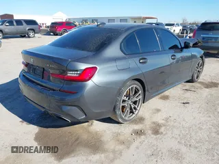 2020 BMW 3 Series M340i with VIN WBA5U7C04LFH15329, listed as a IAAI auction lot 41383675 with Not Provided miles. Bid and sale history available at carsss.com. Image 4.