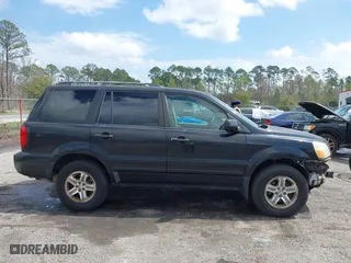 2004 Honda Pilot EX with VIN 5FNYF18514B001334, listed as a IAAI auction lot 41754663 with 208,514 mi miles. Bid and sale history available at carsss.com. Image 13.