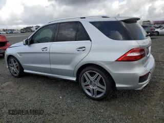2015 Mercedes-Benz M 63 AMG with VIN 4JGDA7EB7FA504173, listed as a Copart auction lot 47596605 with 114,001 mi miles and Salvage Title. Bid and sale history available at carsss.com. Image 2.