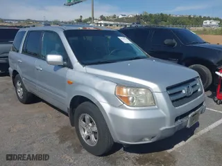 2007 Honda Pilot EX-L with VIN 5FNYF28587B012793, listed as a IAAI auction lot 41964324 with 230,128 mi miles. Bid and sale history available at carsss.com. Image 1.
