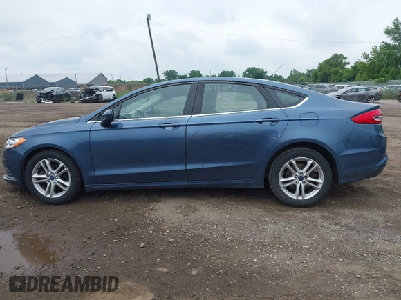 2018 Ford Fusion SE with VIN 3FA6P0HD9JR192927, listed as a IAAI auction lot 42616919 with 90,623 mi miles and . Bid and sale history available at DreamBid. Image 14.
