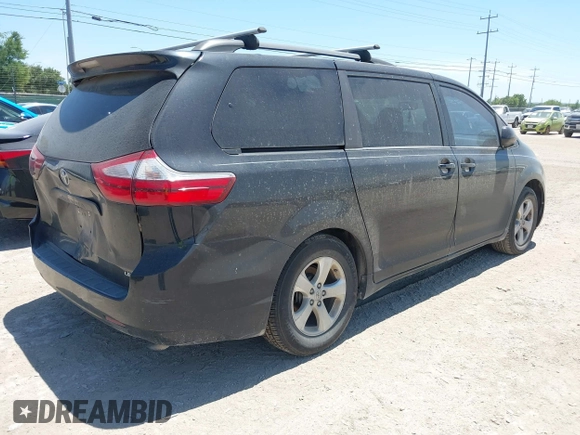 2015 Toyota Sienna LE AAS with VIN 5TDKK3DC7FS687525, listed as a IAAI auction lot 42250458 with 140,429 mi miles and . Bid and sale history available at DreamBid. Image 4.