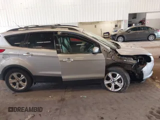 2013 Ford Escape SE z VIN 1FMCU9GX8DUD56926, wystawiony jako IAAI lot #41871248 z przebiegiem 36 807 mil mil oraz . Historia ofert i sprzedaży dostępna na DreamBid. Obrazek 13.