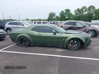 2021 Dodge Challenger R/T Scat Pack z VIN 2C3CDZFJ2MH559741, wystawiony jako IAAI lot #42264991 z przebiegiem 51 040 mil mil oraz . Historia ofert i sprzedaży dostępna na DreamBid. Obrazek 13.