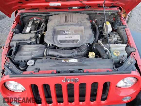 2015 Jeep Wrangler Willys Wheeler with VIN 1C4AJWAG9FL543998, listed as a Copart auction lot 88947025 with 142,433 mi miles and Salvage title. Bid and sale history available at DreamBid. Image 12.