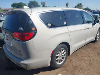 2017 Chrysler Pacifica Touring with VIN 2C4RC1DG6HR633826, listed as a IAAI auction lot 42170041 with 143,481 mi miles and . Bid and sale history available at DreamBid. Image 4.