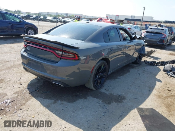 2018 Dodge Charger SXT with VIN 2C3CDXBG4JH187913, listed as a IAAI auction lot 42039379 with 146,618 mi miles and . Bid and sale history available at DreamBid. Image 4.