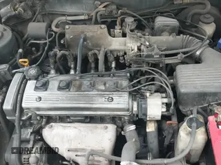 1995 Toyota Corolla DX z VIN 1NXAE09B5SZ343971, wystawiony jako IAAI lot #42409335 z przebiegiem 282 196 mil mil oraz . Historia ofert i sprzedaży dostępna na DreamBid. Obrazek 18.