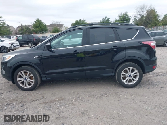 2017 Ford Escape SE with VIN 1FMCU9GD0HUC58128, listed as a IAAI auction lot 42078045 with 125,503 mi miles. Bid and sale history available at carsss.com. Image 14.