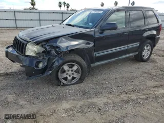 2007 Jeep Grand Cherokee Laredo with VIN 1J8HS48P37C594980, listed as a Copart auction lot 74819394 with 105,904 mi miles and Salvage Title. Bid and sale history available at carsss.com. Image 1.