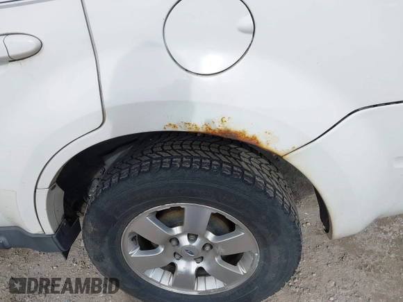 2012 Ford Escape Limited with VIN 1FMCU0E7XCKB71186, listed as a IAAI auction lot 41660455 with 160,863 mi miles. Bid and sale history available at carsss.com. Image 12.