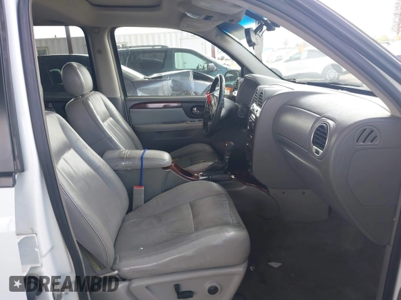 2005 GMC Envoy XL SLE with VIN 1GKET16S056151523, listed as a IAAI auction lot 42137483 with 189,778 mi miles. Bid and sale history available at carsss.com. Image 5.