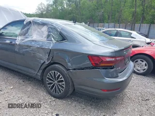 2019 Volkswagen Jetta S z VIN 3VWC57BUXKM121316, wystawiony jako IAAI lot #42290107 z przebiegiem 117 371 mil mil oraz . Historia ofert i sprzedaży dostępna na DreamBid. Obrazek 12.