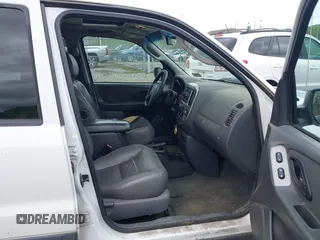 2003 Ford Escape XLT Popular 2 with VIN 1FMYU93193KC06499, listed as a IAAI auction lot 42192640 with 180,095 mi miles and . Bid and sale history available at DreamBid. Image 5.