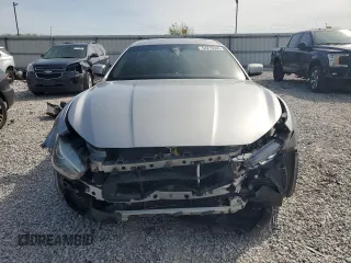 2014 Maserati Ghibli z VIN ZAM57XSA8E1087661, wystawiony jako Copart lot #54215595 z przebiegiem 108 280 mil mil oraz Szkoda całkowita • Salvage title. Historia ofert i sprzedaży dostępna na DreamBid. Obrazek 5.