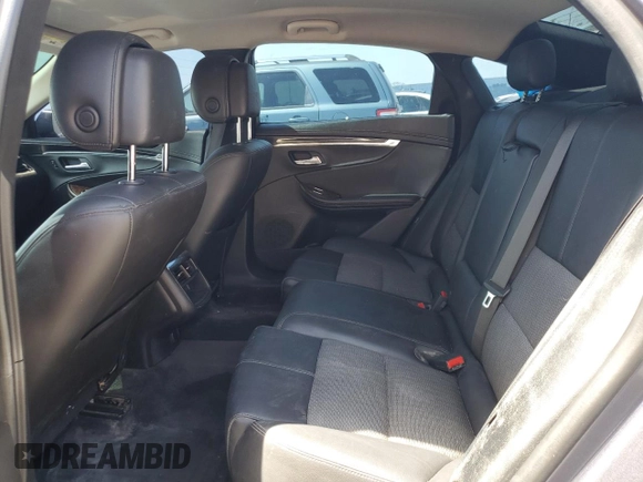 2014 Chevrolet Impala LT with VIN 2G1115SL2E9244163, listed as a Copart auction lot 57328675 with 136,548 mi miles and Salvage title. Bid and sale history available at DreamBid. Image 10.