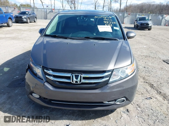 2016 Honda Odyssey Touring Elite with VIN 5FNRL5H90GB128006, listed as a IAAI auction lot 41695438 with 133,337 mi miles. Bid and sale history available at carsss.com. Image 12.