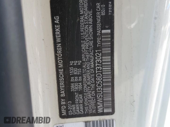 2013 MINI Hardtop with VIN WMWSU3C58DT373021, listed as a Copart auction lot 52945845 with 83,865 mi miles and Salvage Title. Bid and sale history available at DreamBid. Image 12.