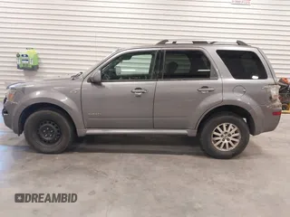2008 Mercury Mariner Premier z VIN 4M2CU87108KJ15433, wystawiony jako IAAI lot #41924055 z przebiegiem 168 569 mil mil oraz . Historia ofert i sprzedaży dostępna na DreamBid. Obrazek 14.