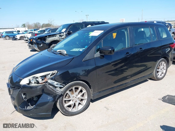 2012 Mazda Mazda5 Grand Touring with VIN JM1CW2DLXC0138533, listed as a IAAI auction lot 41609270 with 263,625 mi miles. Bid and sale history available at carsss.com. Image 17.