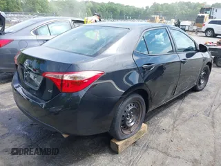 2018 Toyota Corolla L with VIN 2T1BURHE7JC018388, listed as a IAAI auction lot 42102862 with 111,882 mi miles and . Bid and sale history available at DreamBid. Image 4.