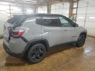 2023 Jeep Compass Trailhawk z VIN 3C4NJDDN9PT557910, wystawiony jako Copart lot #59387825 z przebiegiem 39 686 mil mil oraz Czysty tytuł • Clean title. Historia ofert i sprzedaży dostępna na DreamBid. Obrazek 3.