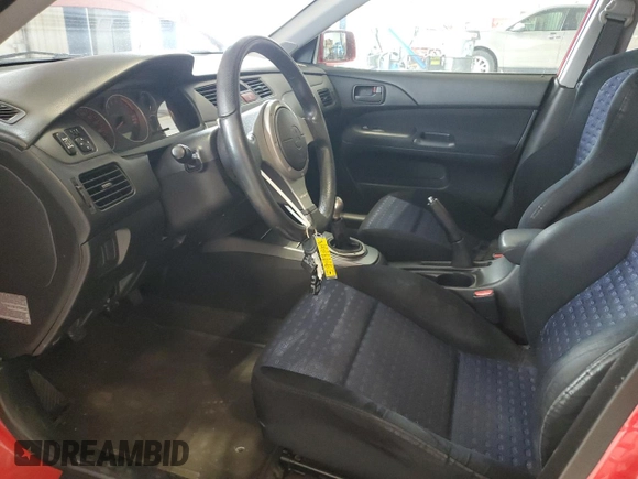 2005 Mitsubishi Lancer Evolution VIII z VIN JA3AH86DX5U016842, wystawiony jako Copart lot #51257475 z przebiegiem 72 698 mil mil oraz Szkoda całkowita • Salvage title. Historia ofert i sprzedaży dostępna na DreamBid. Obrazek 7.