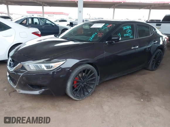 2016 Nissan Maxima SL z VIN 1N4AA6AP5GC382668, wystawiony jako IAAI lot #41451440 z przebiegiem 163 884 mil mil oraz . Historia ofert i sprzedaży dostępna na DreamBid. Obrazek 2.