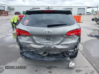 2014 Hyundai Santa Fe with VIN 5XYZU3LB2EG155127, listed as a IAAI auction lot 41864518 with Not provided miles and . Bid and sale history available at DreamBid. Image 17.