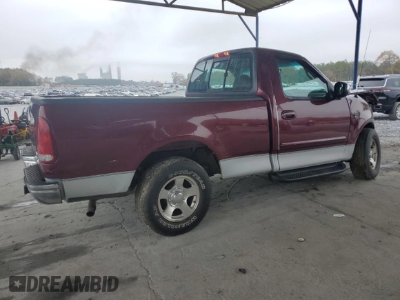 1999 Ford F-150 XL with VIN 2FTRF17L0XCB19827, listed as a Copart auction lot 85282164 with 52,103 mi miles and Salvage title. Bid and sale history available at DreamBid. Image 3.