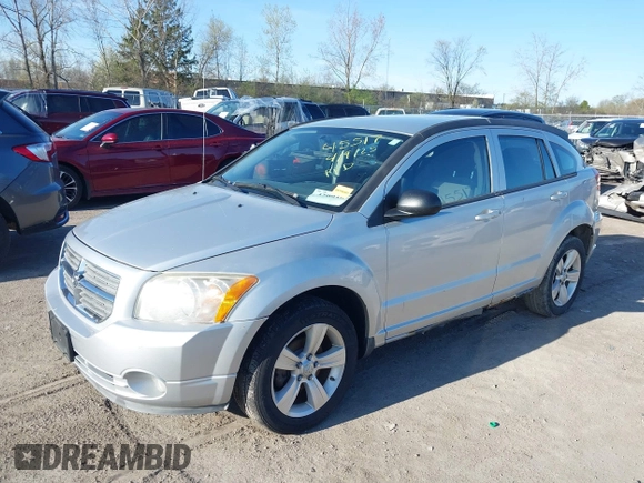 2012 Dodge Caliber SXT with VIN 1C3CDWDAXCD508338, listed as a IAAI auction lot 42091675 with 213,596 mi miles and . Bid and sale history available at DreamBid. Image 17.
