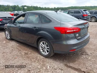 2016 Ford Focus SE z VIN 1FADP3F2XGL397092, wystawiony jako IAAI lot #42619802 z przebiegiem 232 252 mil mil oraz . Historia ofert i sprzedaży dostępna na DreamBid. Obrazek 3.