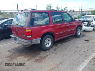 1996 Ford Explorer XLT z VIN 1FMDU32P9TZA66446, wystawiony jako IAAI lot #42643571 z przebiegiem 174 927 mil mil oraz . Historia ofert i sprzedaży dostępna na DreamBid. Obrazek 4.