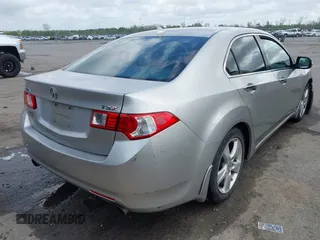 2009 Acura TSX with VIN JH4CU26619C021586, listed as a IAAI auction lot 41942680 with 171,841 mi miles. Bid and sale history available at carsss.com. Image 4.