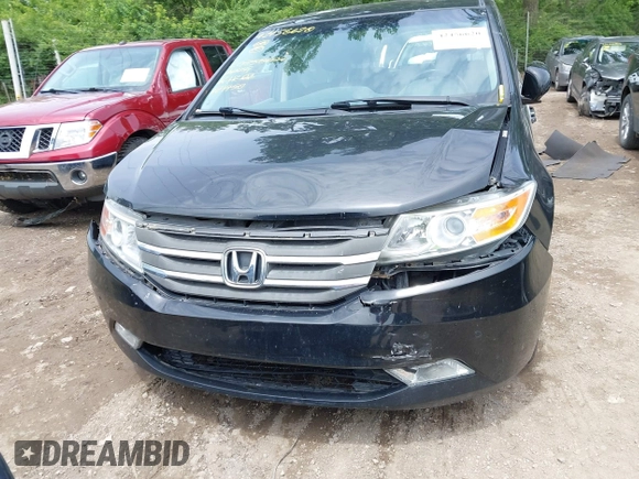 2012 Honda Odyssey Touring with VIN 5FNRL5H91CB121950, listed as a IAAI auction lot 42456620 with 200,831 mi miles and . Bid and sale history available at DreamBid. Image 12.