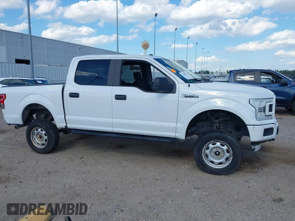 2019 Ford F-150 XL with VIN 1FTEW1EP7KFB10186, listed as a IAAI auction lot 42230640 with 105,234 mi miles and . Bid and sale history available at DreamBid. Image 13.
