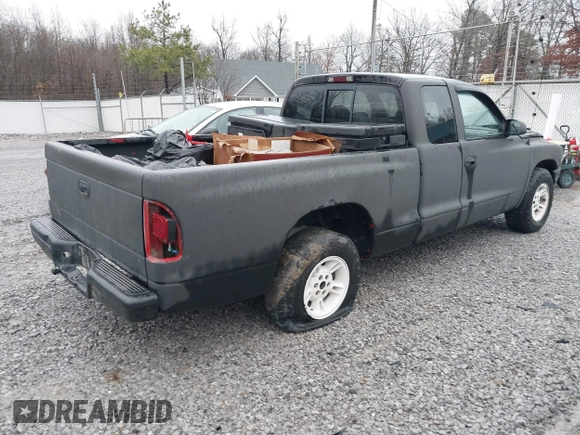 1999 Dodge Dakota SLT z VIN 1B7GL22X3XS181329, wystawiony jako IAAI lot #41480264 z przebiegiem 227 616 mil mil oraz . Historia ofert i sprzedaży dostępna na DreamBid. Obrazek 4.