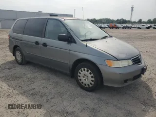 2002 Honda Odyssey LX z VIN 2HKRL18572H531397, wystawiony jako Copart lot #54533535 z przebiegiem 241 052 mil mil oraz Czysty tytuł • Clean title. Historia ofert i sprzedaży dostępna na DreamBid. Obrazek 4.