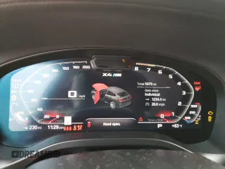 2022 BMW X4 M z VIN 5YM23EC00N9M68670, wystawiony jako Copart lot #80404663 z przebiegiem 5979 mil mil oraz . Historia ofert i sprzedaży dostępna na DreamBid. Obrazek 9.