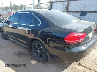 2015 Volkswagen Passat 1.8T Limited Edition with VIN 1VWAT7A36FC118099, listed as a IAAI auction lot 41919223 with 103,916 mi miles. Bid and sale history available at carsss.com. Image 3.