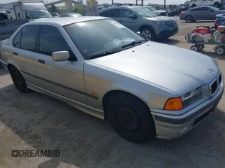1997 BMW 3 Series 318iA with VIN WBACC0322VEK25478, listed as a IAAI auction lot 42033040 with 212,320 mi miles. Bid and sale history available at carsss.com. Image 1.