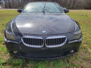 2005 BMW 6 Series 645Ci with VIN WBAEK73445B261180, listed as a IAAI auction lot 41768424 with 128,824 mi miles. Bid and sale history available at carsss.com. Image 6.