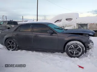2014 Chrysler 300 with VIN 2C3CCAGG9EH297337, listed as a IAAI auction lot 41268387 with 104,542 mi miles. Bid and sale history available at carsss.com. Image 14.