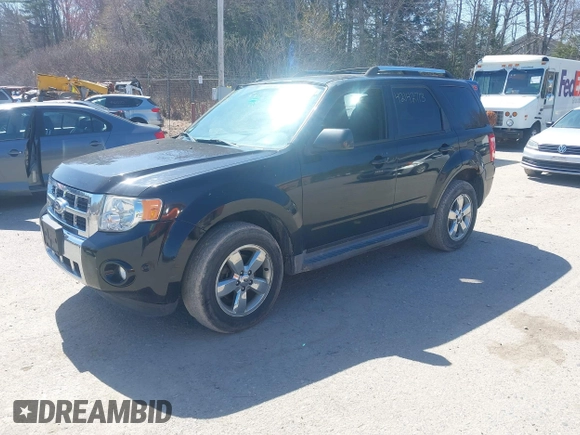 2012 Ford Escape Limited with VIN 1FMCU9EG1CKA40720, listed as a IAAI auction lot 42142713 with 127,658 mi miles. Bid and sale history available at carsss.com. Image 2.